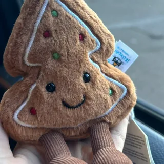 Jellycat Amuseables Tree Cookie, a gingerbread Christmas tree soft toy, photographed by Plushie Finds